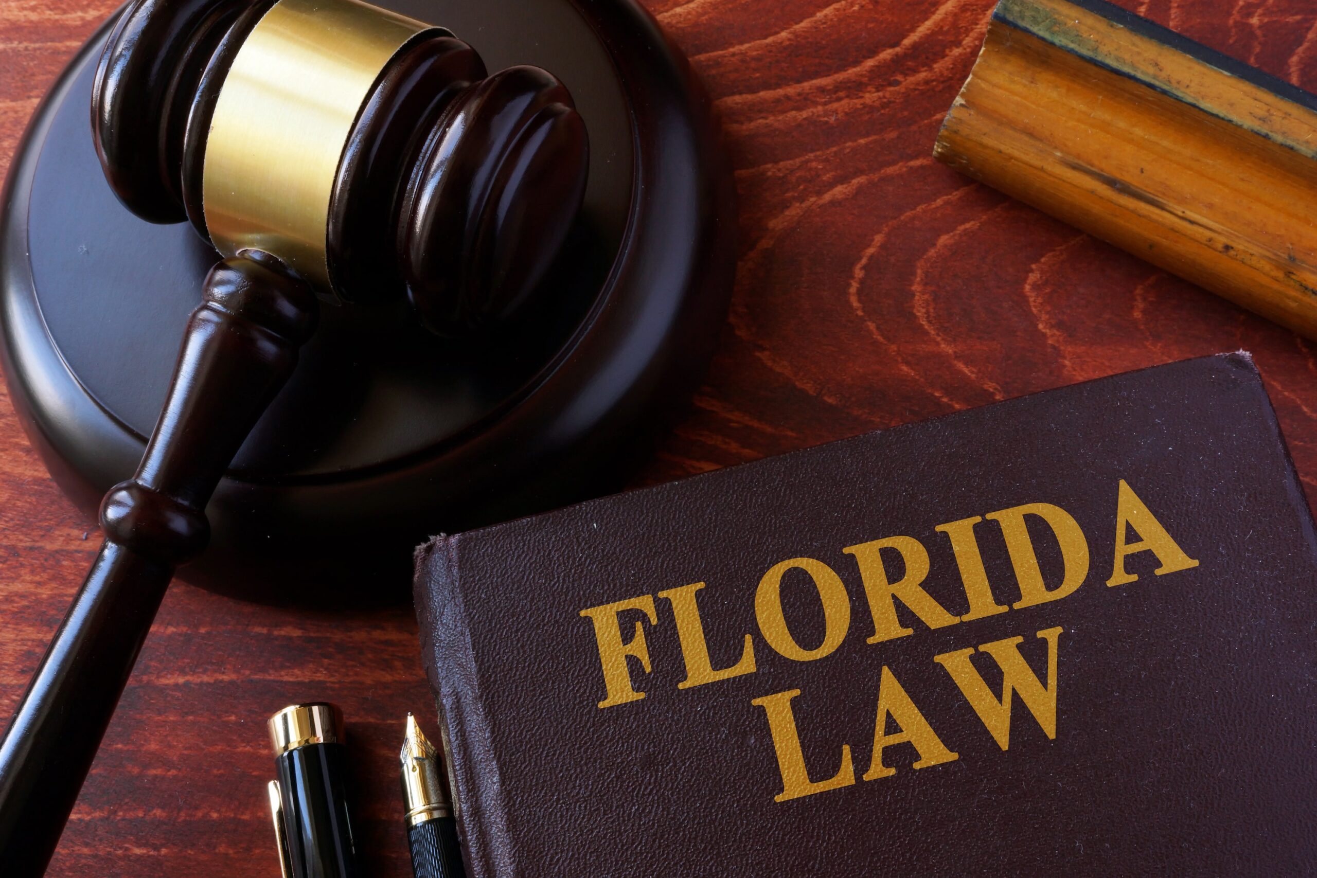 Florida Law book next to judge gavel